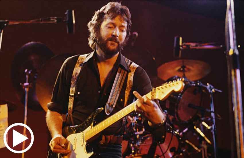 Eric Clapton tocando guitarra